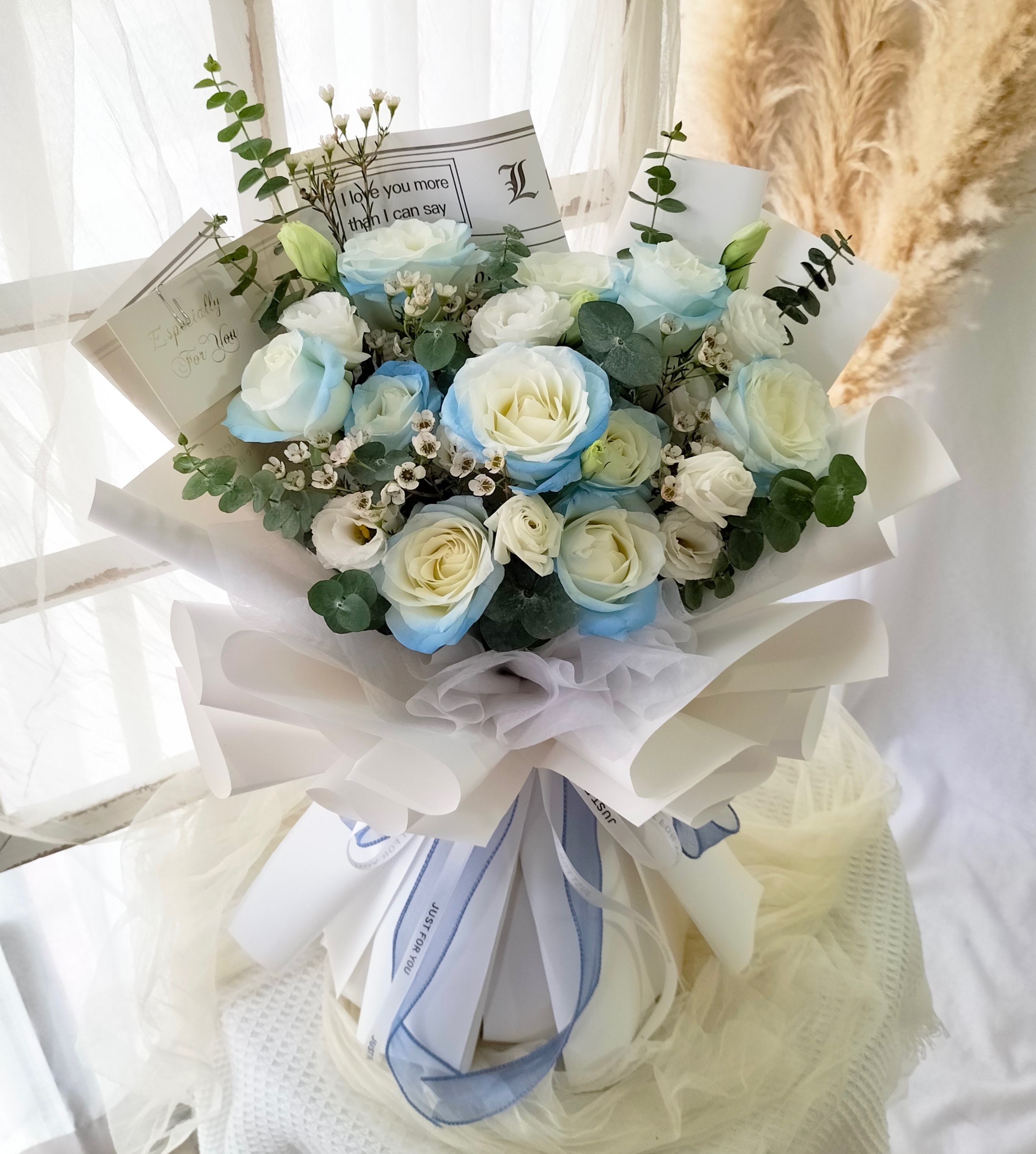 Livie Baby Blue Roses Bouquet